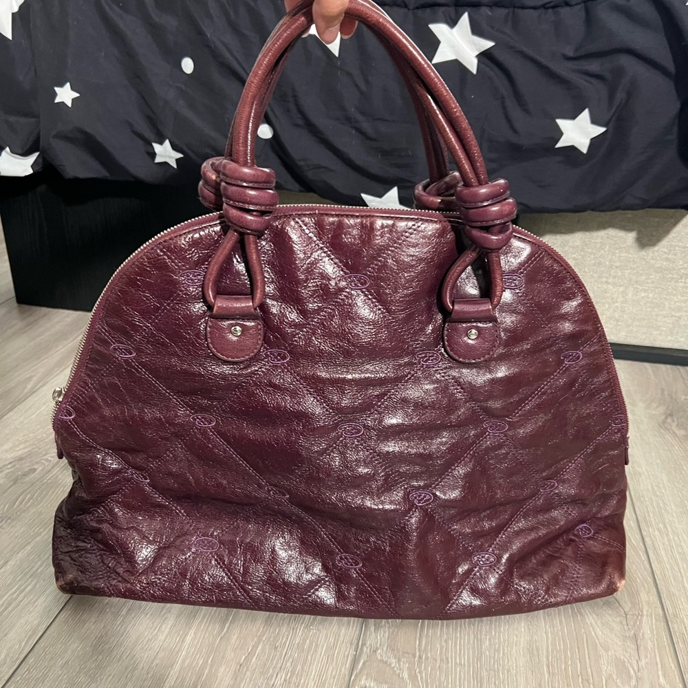 eggplant color oscar de la renta duffle bag